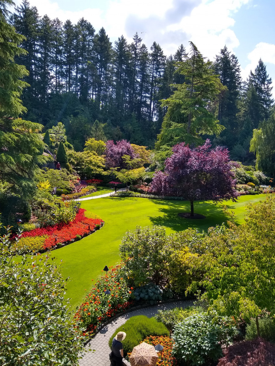The Butchart Gardens is a group of floral display gardens in Brentwood Bay, British Columbia, Canada, located near Victoria on Vancouver Island. The gardens receive over a million visitors each year. The gardens have been designated a National Historic Site of Canada. source:Wikipedia