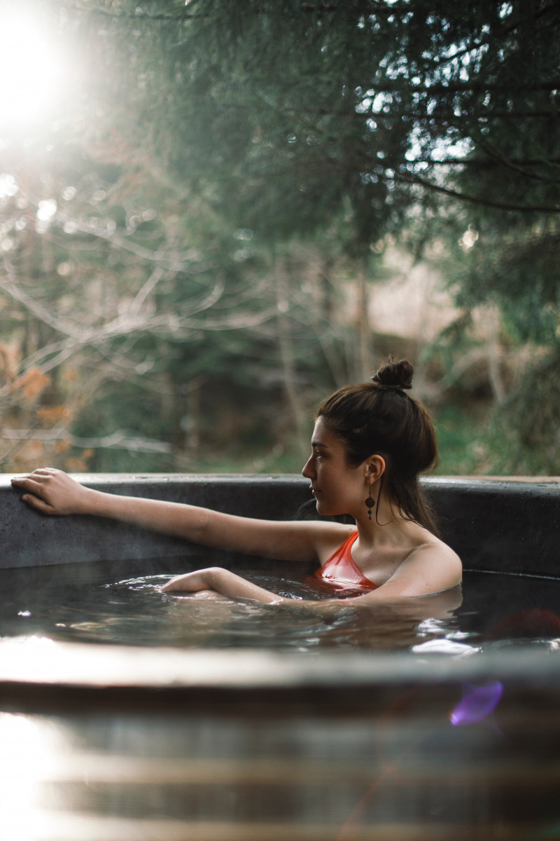 woman in hot tub during daytime